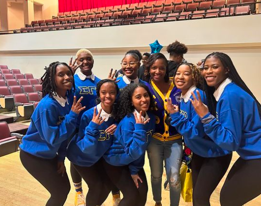 Sigma Gamma Rho Sorority Inc. New Members and their advisor.